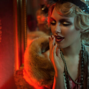 Retro portrait of a beautiful Gatsby woman. Vogue fashion style and smoke